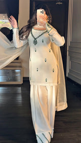 DRESS CODE: Emerald Swan